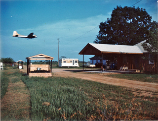 Conyers Farmhouse with low flying plane